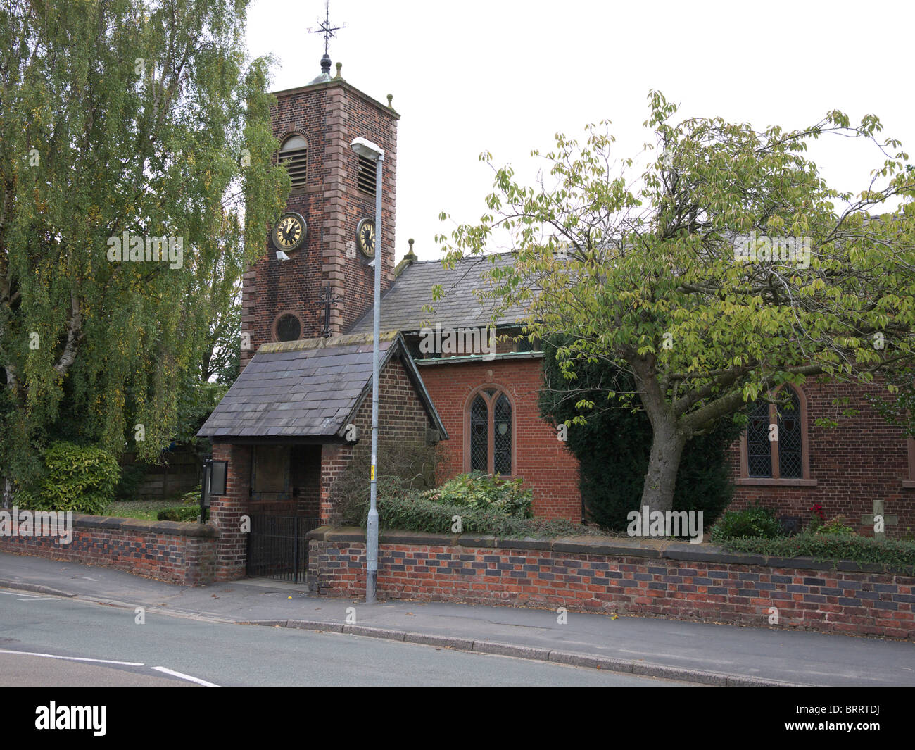 St Micheal`s and All Angels Church, Burtonwood village, Warrington, Cheshire, England UK. Stock Photo